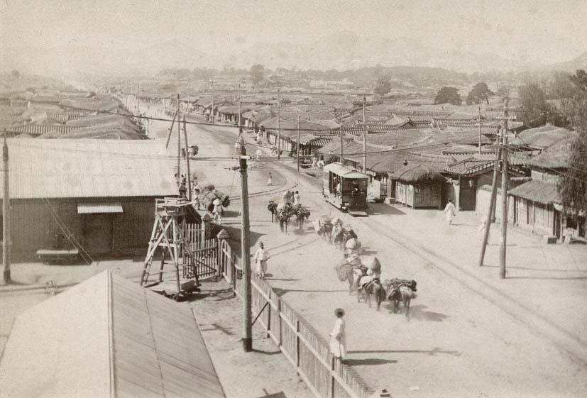 Panoramic view of a suburb town with tramway (Shanghai?).