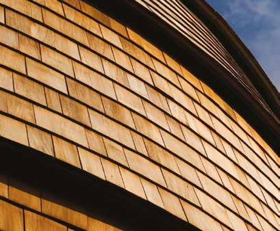 A Shake is hand split from a block of cedar along the natural grain of the wood and then resawn to produce one smooth surface. They can be used for both roofing and cladding.
