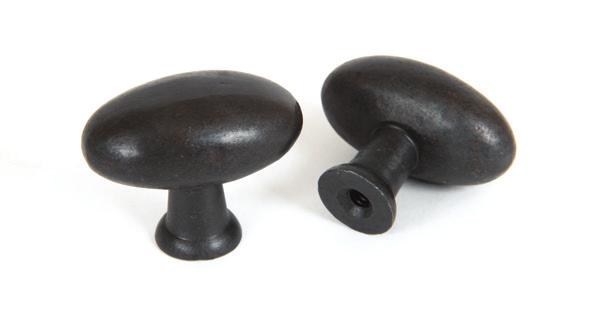 Marches Cupboard Knobs Beaten Cupboard Knob Hammered Knob Oval Knob Hand-crafted beaten cupboard knob in a Black or Pewter Patina finish. M4 threaded machine screw supplied.