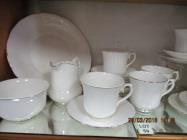teapot, milk jug, sugar bowl with lid, cake plate and 6 trios.