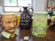 00 320 322 323 326 333 A collection of 3 musical jugs comprising a Shakespeare tankard