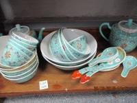hinese dinnerware in a turquoise colour comprising 2 teapots, 2 serving bowls, 8 bowls