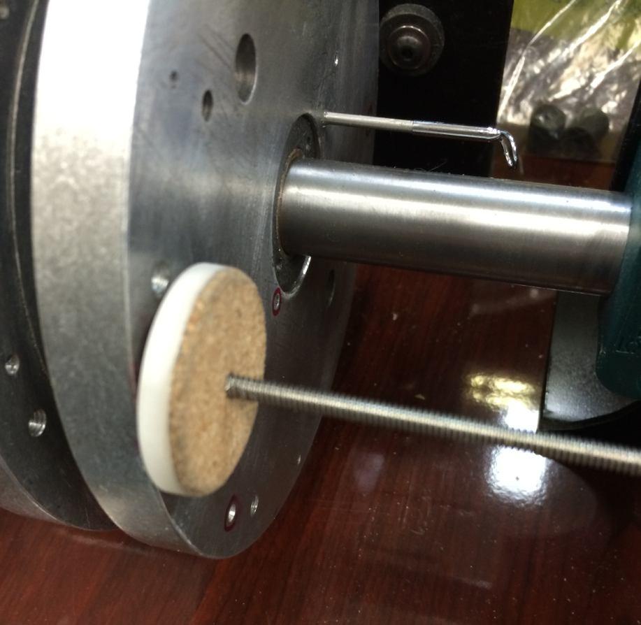 In the new design the spool is mounted on a spindle that has an acetal