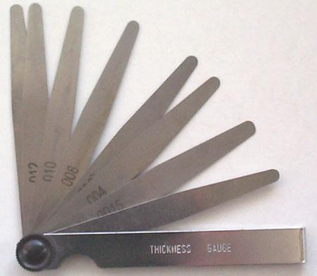 These contain a series of metal strips with parallel surfaces. They are used to check the clearance between surfaces.