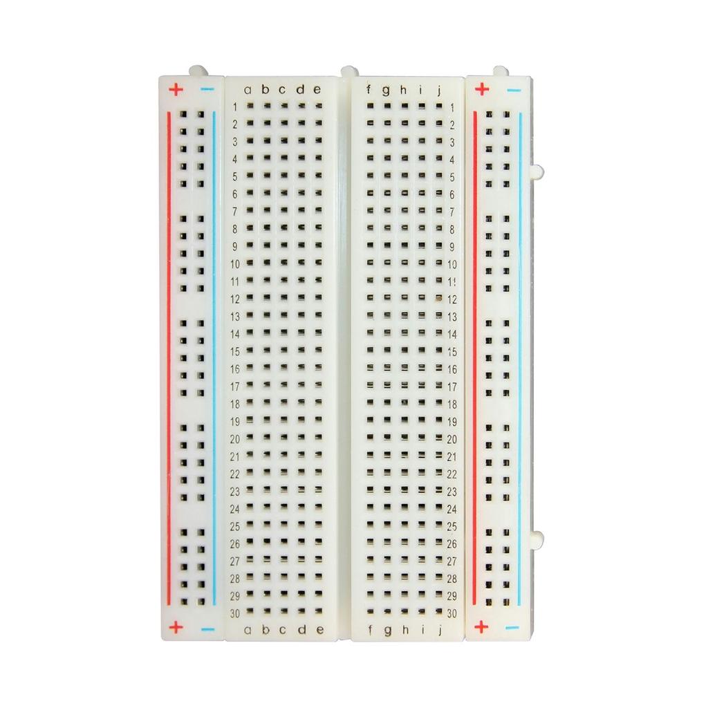 Step 1: Insert 555 chip and some wires, resistors This is a breadboard. Use your breadboard facing you in this orientation shown while following this musical pencil tutorial.
