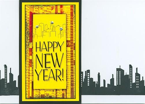 December 2012 Bright Lights, Big City Greetings to Go Page 4 of 6 Card #2 Yellow Cutapart: Happy New Year! 1. Stamp the UM skyline onto the White card with India Black ink. 2. Nest the Yellow cutapart onto the Yellow and Black panels and attach to the card.