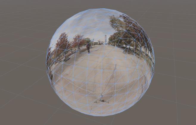 Figure 3 A digital sphere, displayed in Unity's editor, that is using EasyMovieTexture as its texture to play a video on its surface.