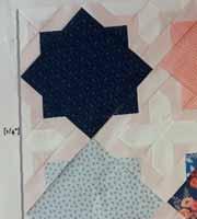 ) Continue piecing your cross blocks and pieced borders, always paying attention to where the 2" squares need to be placed to match their Layer cake blocks.