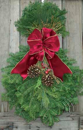 4 MATCHING DOOR SPRAYS OF MIXED EVERGREENS ARE APPROXIMATELY 26 LONG CLASSIC SPRAY The combination of mixed evergreens of the Classic Spray are accented with a generous gold backed red velveteen bow