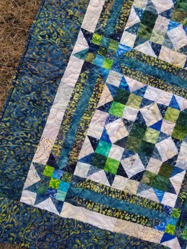I did some simple loopy loops for a quilting motif. light variegated thread. I used a When I showed the quilt to Hubby he said, Wow, that is a lot of little pieces.