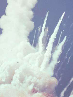 The Challenger exploded. The sky filled with fire and. a huge cloud of smoke. The shuttle and its crew were lost.