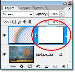 This adds a layer mask thumbnail, filled with white, to the right of the Rainbow layer contents thumbnail in the Layers palette: The layer mask itself is now currently selected, which you can tell by