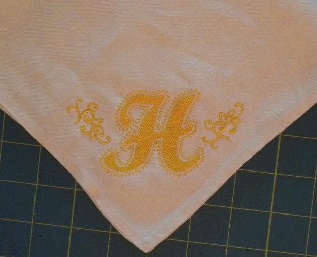 This way you can always make changes to the design. Embroider Napkin: 1. Use Best Press on the corner of your napkin where the embroidery will be placed. 2.