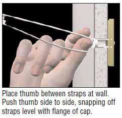 Push thumb side to side, snapping off the straps level with the flange of the cap. Place standoff to the wall over the flange.