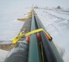 The pipeline design utilized limit state strain criteria to meet the challenges of an Arctic environment and marginal field economics.