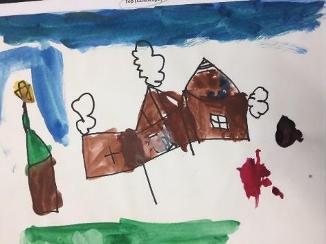 They added windows, doors and other details in sharpie. Then, they painted their drawings with watercolors.