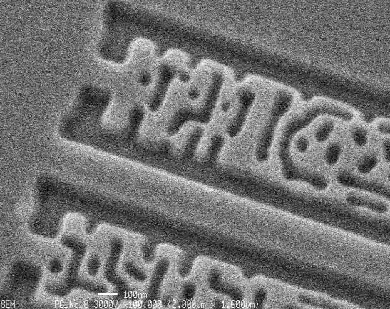 Ishikawa, et al: "Hybrid EB-writing technique with a 50kV-VSB writer and a 100kV-SB writer for nanoimprint mold fabrication" Proc.