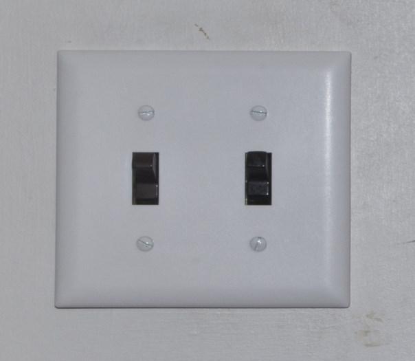 A standard size switch plate is used in this house, but if the switch outlet needs to cover a larger wall area, jumbo size switch plates are