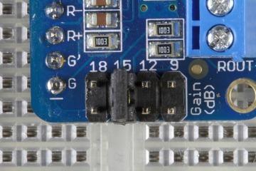 Connect your speakers using the 3.5mm screw-terminal blocks. Gain: Gain is configurable for 9, 12, 15 or 18 db.
