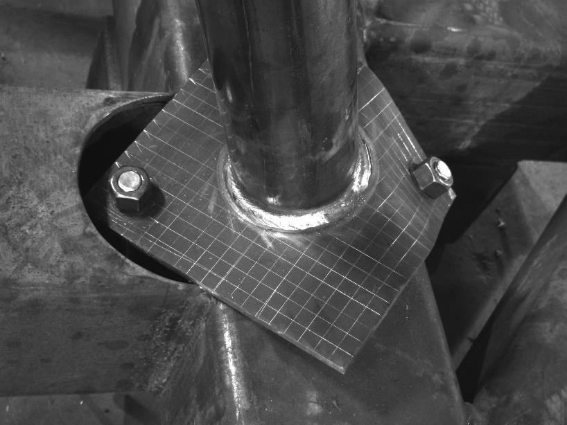 Figure 5.19: Test 05 image showing crack initiation around weld at the back of the pier Figure 5.20: Test 05 FEA stress in base plate The maximum stress on the plate given by the FEA was 530 MPa.