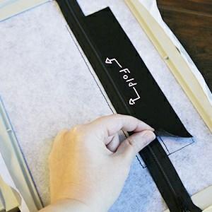 Don't worry if it sews over the tape -- the tape can be easily torn away from around the stitches.