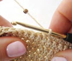 Beaded double crochet US: Beaded single crochet When you incorporate beads into a double (single)