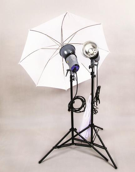 C This $350 kit by Impact, with its two 300 watt-second monolights, stands, and umbrella reflectors, is an economical strobe starter kit. (flash) or hot (constant) lights.
