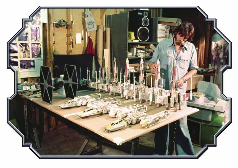 A behind-the-scenes photo taken during the production of Star Wars: A New Hope, showing the original filming models.