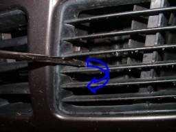 3. If you lie on your back and look on the underside of the bumper, you will see a hole with a socket head bolt.