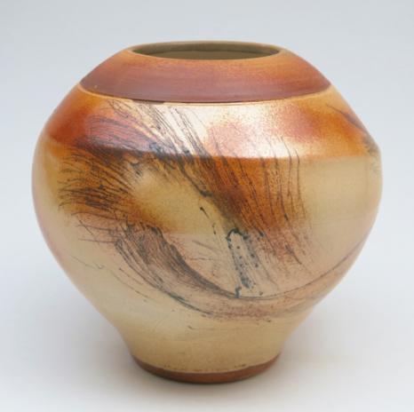 $135 290 Vase in lustrous cream and toasty orange below the rich mahogany shoulder with