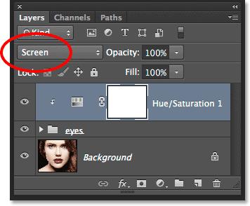 Notice in the Layers panel that the adjustment layer is indented to the right with a small arrow pointing down at the layer group below it.