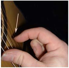 " This will produce the notes A, D, G, B and E respectively (pluck the A and D with your thumb, but use your pointer finger to pluck the thinnest 3 strings G, B and E).