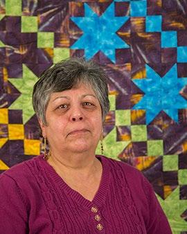 Lori M. She started quilting when she went to an Amish Auction and fell in love with the quilts.