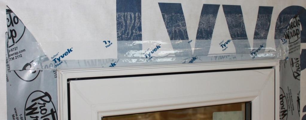 Step 14) - Apply house wrap tape on horizontal seam on top of window to hold