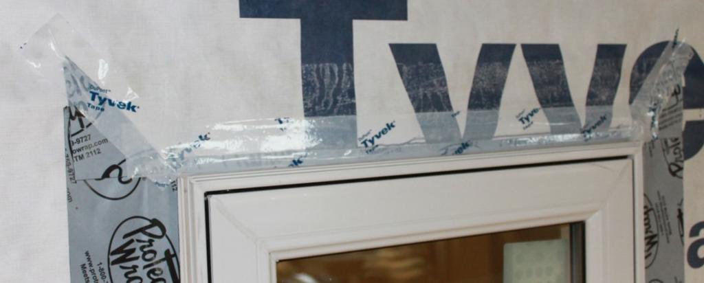 13 Step 15) - Apply house wrap tape on angle seams on top of window. (See Fig.