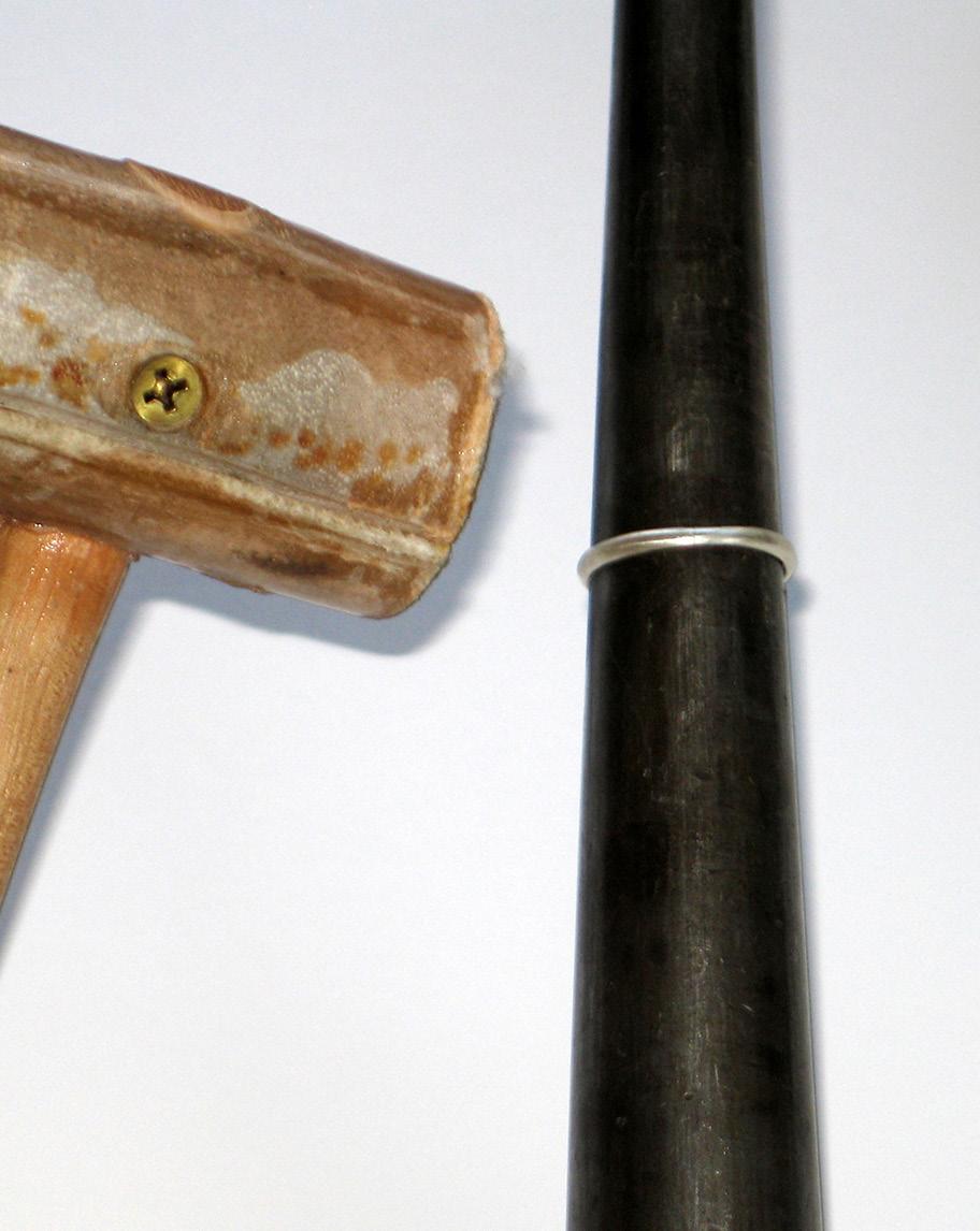 With large half-round pliers, or a mandrel and a rawhide hammer, shape the bezel into an oval [4].