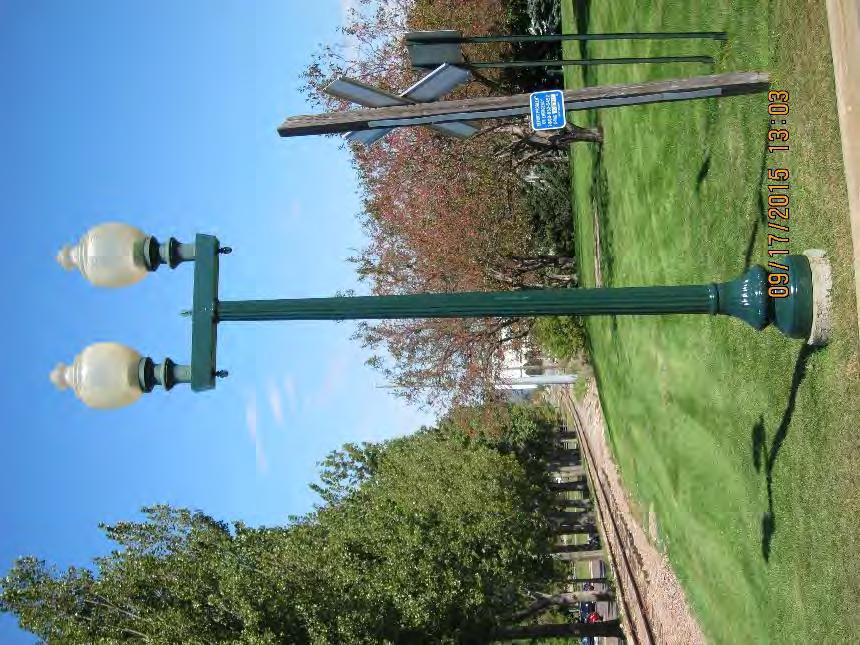 the top sconces of the light pole were not coated so they could act as a control to compare with the performance of NCI overtime.