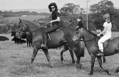 Jackie Kennedy rides horses with her children. Jacqueline Kennedy President: John F.