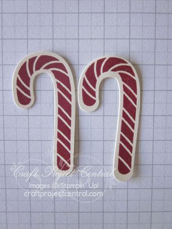 Stamp the candy cane from the Scentsational Season stamp set twice onto Very Vanilla card stock using Cherry Cobbler ink. Cut out using the matching Holiday Collection Framelits die.