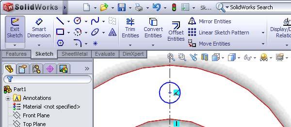 10 Click on Circle in the CommandManager, and draw a small circle like in the illustration on the
