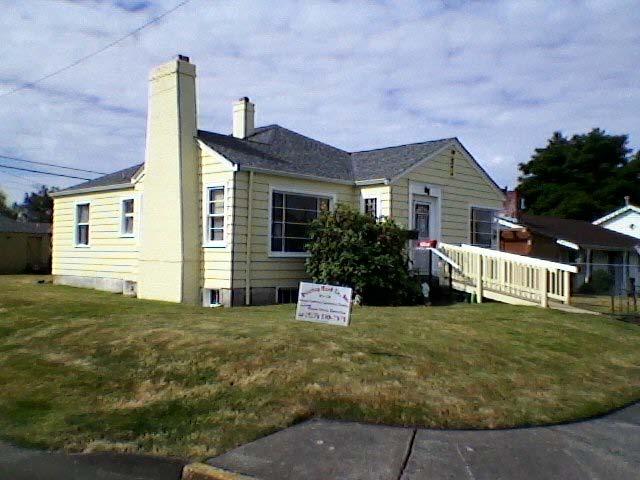 Lead Paint Project ~ Marysville, Washington This older home in Marysville received chimney repair, extensive re-glazing on the original windows, some dry rot repairs, and finally repainting.