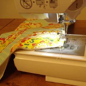 ) and sew a 1/2 seam allowance across the top of the pocket.