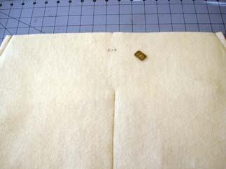 Sew a 1/2 seam allowance down both sides of the lining.