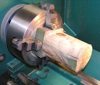 A mandrel was made from a piece of 4X4. It was turned to be a force fit inside the dome.
