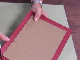 Ink the second piece of scored Maroon Plain cardstock in the same way. Assemble the covers.