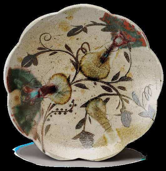 5 1 Matt Jones platter, 17 in. (3 cm) in diameter, wood-fired stoneware.