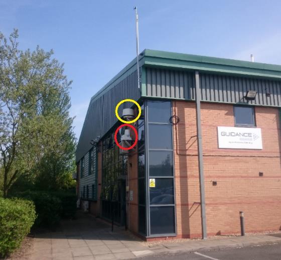 Collocated on a building opposite are a radar target (circled yellow), and some retroreflective tape targets (circled red), (Figure 13).