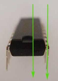 The IC's have a special orientation, marked on the board: the notch shown on the board must align with the notch in the IC (and it is helpful if they line up with the notch in the IC socket).