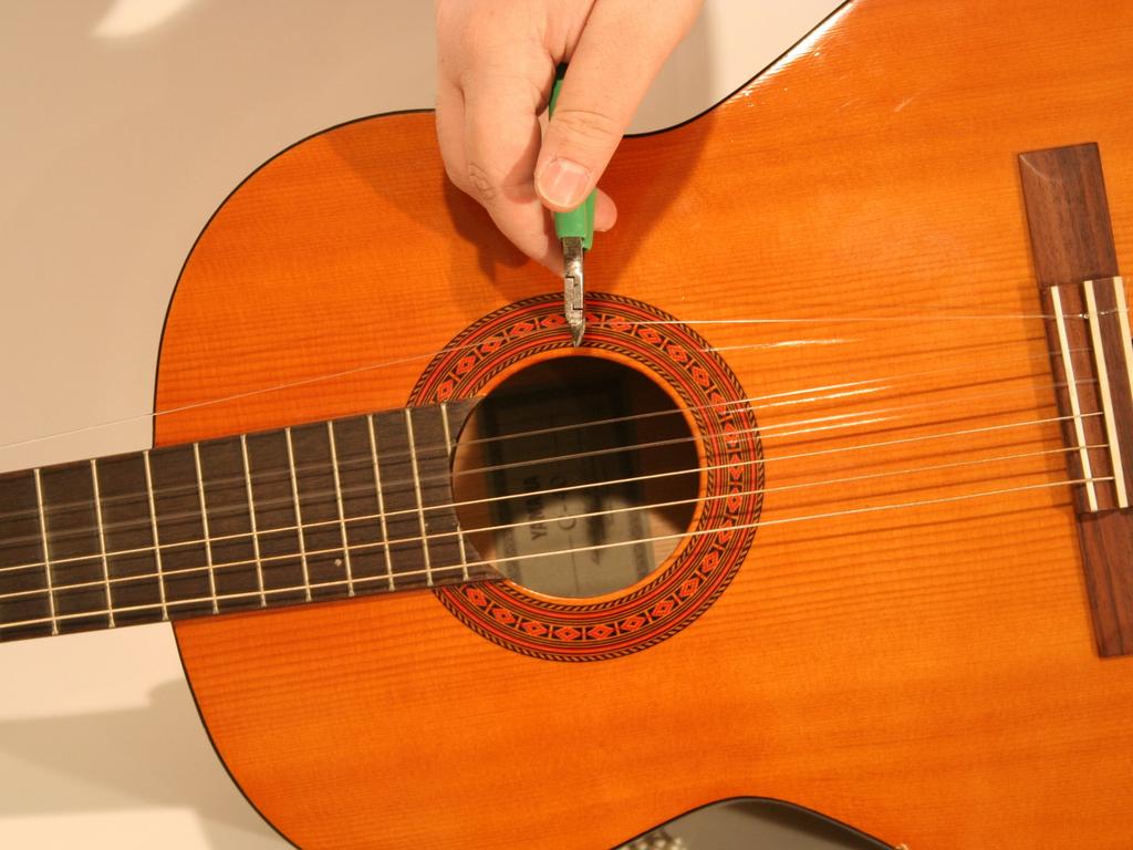 Ensure that all strings are loose before attempting the next step.