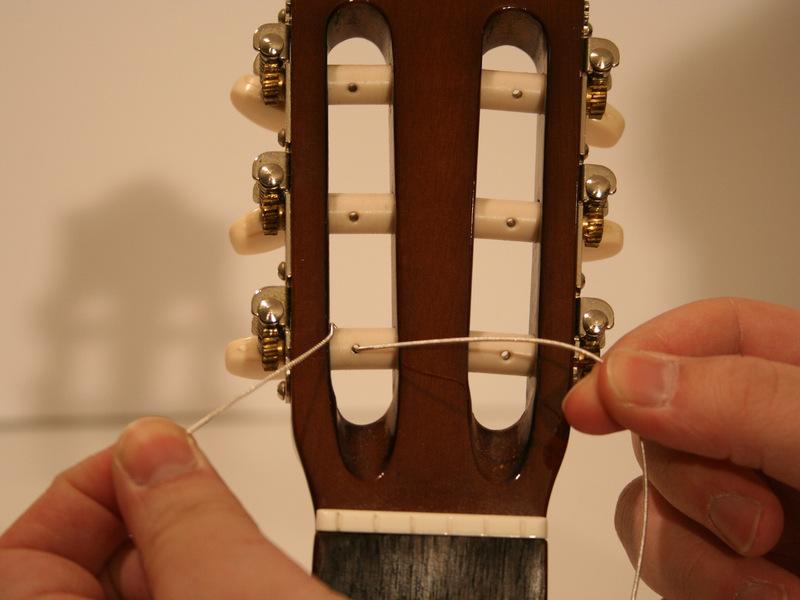 Step 4 Knot the low E, G, and B strings This knot will be used for only the low E, G,